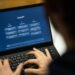 Một người dùng thao tác trên giao diện web của ChatGPT. Ảnh: Reuters